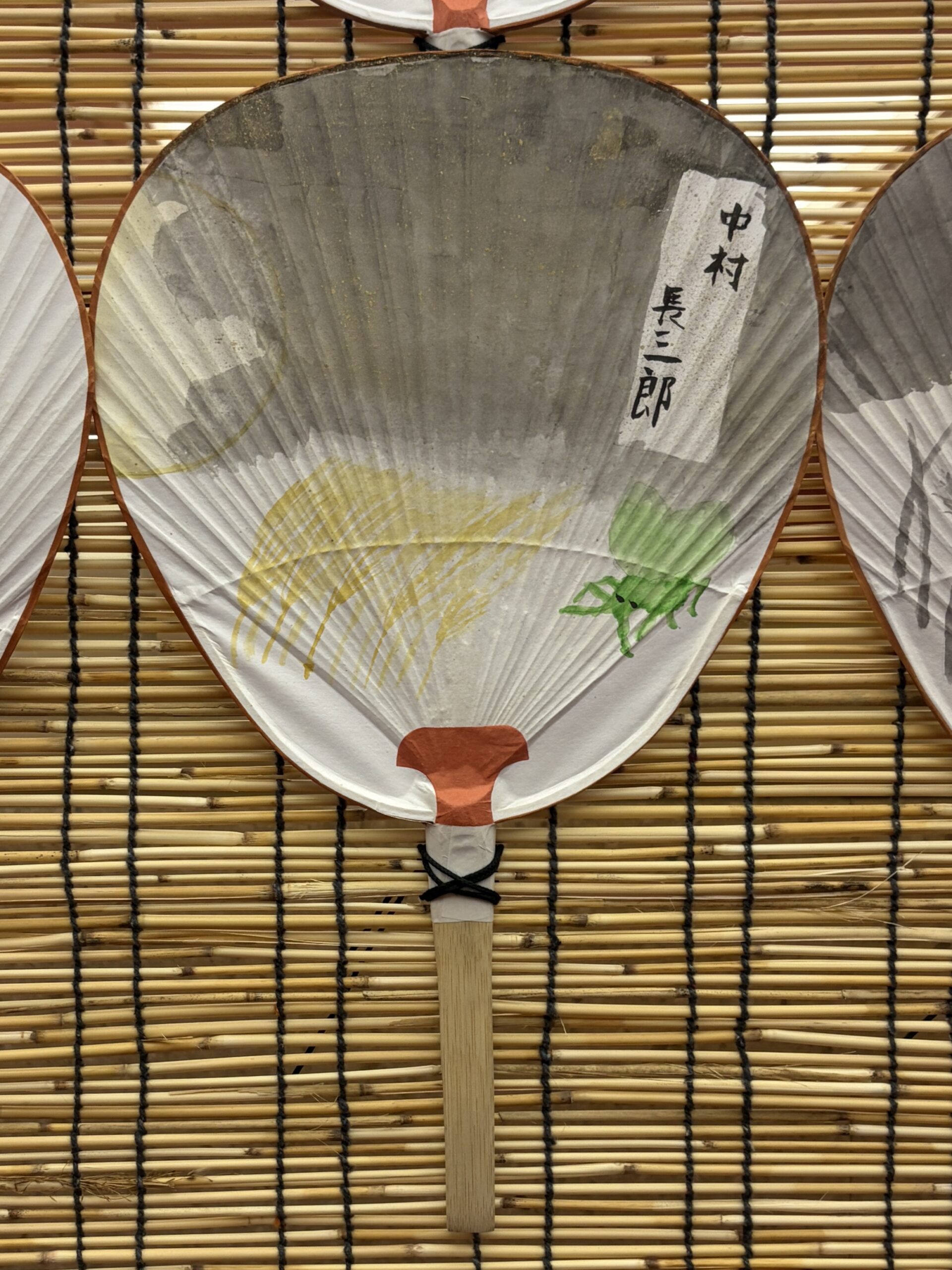 長三郎さんの直筆うちわ